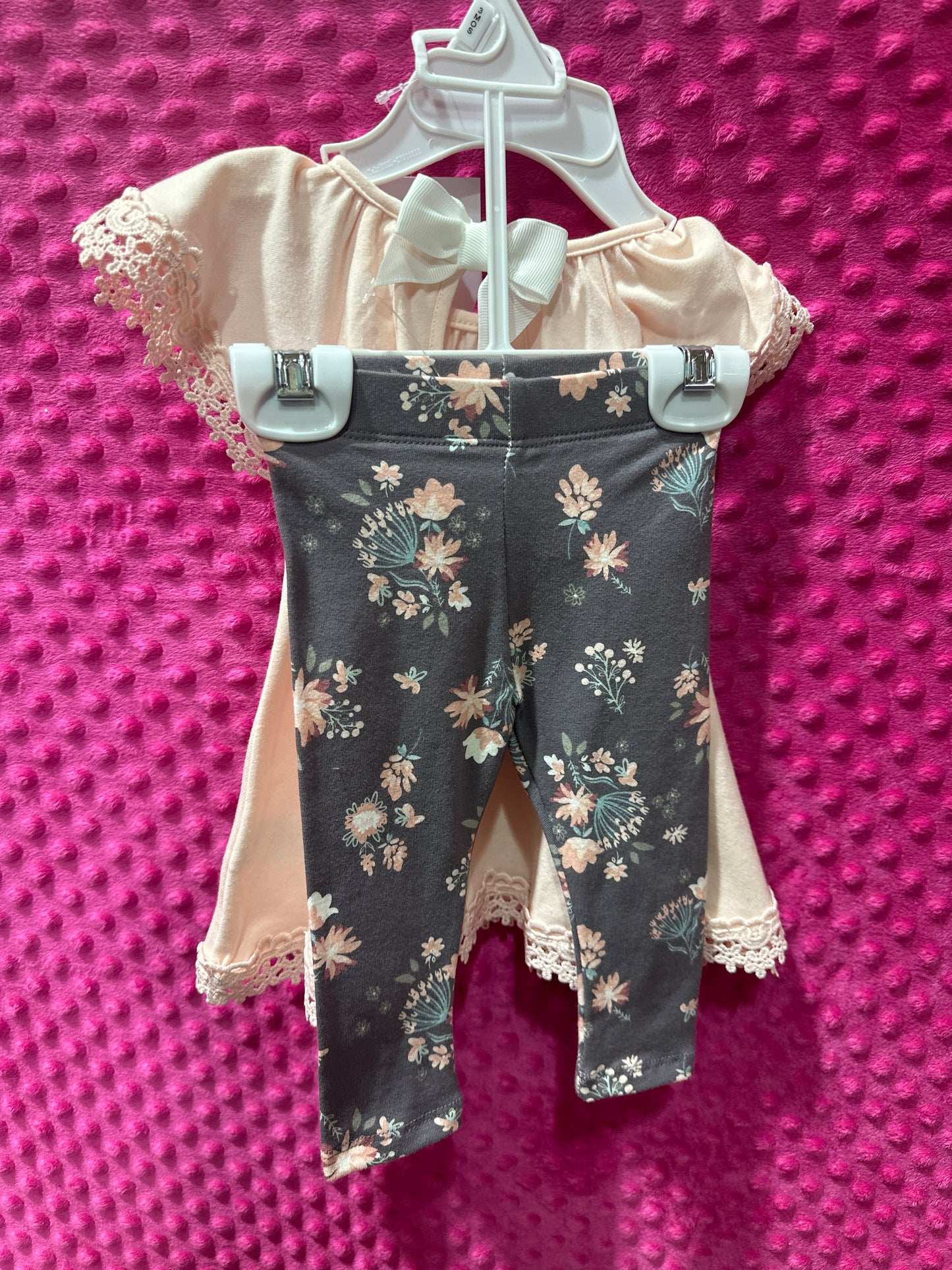 Peach short sleeve shirt with floral leggings